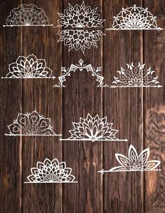 paper cut out flowers on wooden background