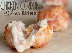 chicken cordon bleu bites on a cutting board with the words chicken cordon bleu bites