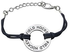 a bracelet with the words field hockey and a circle charm on it's side