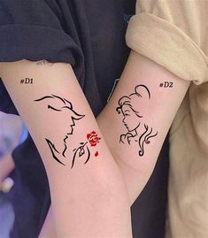 two people with matching tattoos on their arms