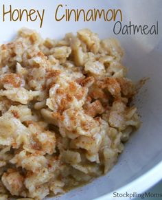 a bowl filled with oatmeal sitting on top of a table