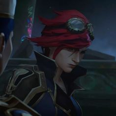 an image of a man with red hair and goggles looking at another man in the background