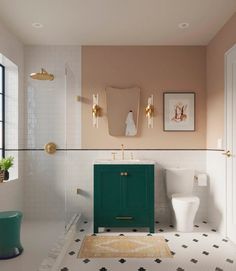 a bathroom with a sink, toilet and green cabinet in the middle of the room