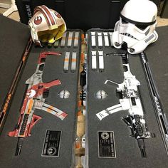 two star wars action figures sit in their cases