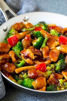 chicken and broccoli stir fry in a skillet