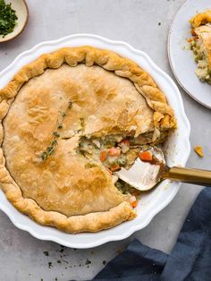 a pie sitting on top of a white plate