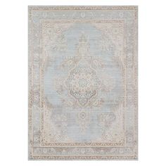 a light blue rug with an ornate design on the front and back side, in grey tones