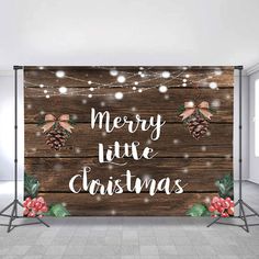 merry little christmas lights and pine cones on wooden planks wallpaper mural printable