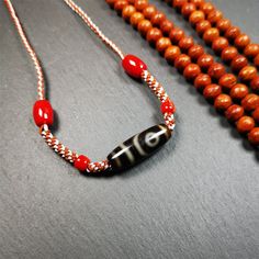 ❤This necklace was hand-woven by Tibetans from Baiyu County, the main bead is a 2 eyed dzi bead, paired with small agate beads,about 30 years old.It can be worn not only as a fashionable accessory but also holds cultural and religious significance.The length of the necklace can be adjusted, the maximum circumference is about 60cm.Dzi beads are precious jewelry from Tibetan culture which are believed to possess the power of bringing good fortune to the owners.You'll get 1pc necklace as pictures s