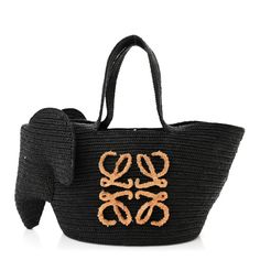 This is an authentic LOEWE Raffia Medium Elephant Basket Tote Bag in Black.This chic tote is crafted of black woven raffia with an elephant head on one side, tall raffia strap handles, and a front beige raffia Loewe logo. The top is open to a spacious raffia interior. Luxury Black Straw Bag With Handles, Designer Black Straw Bag With Top Handle, Designer Black Rectangular Straw Bag, Designer Black Straw Bag With Woven Leather, Luxury Black Woven Straw Bag, Designer Black Woven Bag, Black Straw Bag With Bamboo Handle, Designer Black Bags For Vacation, Loewe Elephant Bag