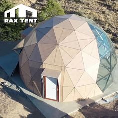 an aerial view of a round building with the words rax tent on it's side