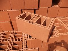 bricks are stacked on top of each other