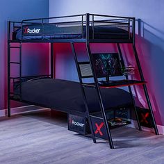 a black metal bunk bed next to a blue wall with a red x logo on it