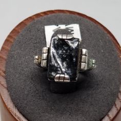 Vintage Sterling with Black Stone Ring, Size 4.5. Not marked but tested positive as Sterling. Stone is 13 x 9mm. Ring is 14mm wide. Weighs 0.13 ozt.  Are these stones real or fake? Aside from diamonds, we do not know if any gemstones are natural or synthetic. We will state on certain gemstones, that we know 100%, if they are created or fake due to their lack of inclusions. For this reason, we do not sell any diamonds without inclusions, and the larger diamonds (half ct+) are soft graded. In recent years, synthetic gemstones are being created to pass the hardness tests, which is why we state clear rubies and emeralds to be created.  In regards to Star Sapphires, typically, a genuine Star Sapphire's star will follow a light source that is shining on it, while created ones stay stationary. In 9mm Ring, European Jewelry, Black Stone Ring, Vintage Fine Jewelry, Star Sapphire, Pure Gold, Black Stone, Selling Jewelry, Stone Ring