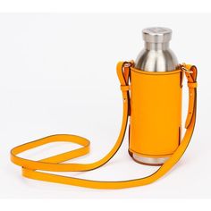 a stainless steel flask bottle on a yellow strap