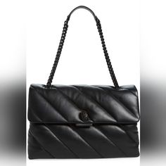 Product Description Soft, Quilted Leather Is Set Off With A Tonal Pull-Through Chain Strap And Eagle-Eyed Clasp On An Oversized Bag Perfect For Days You Want To Be A Little Extra. 14 1/2”W X 9 3/4”H X 5 1/2”D Lined Leather Imported Luxury Black Textured Leather Flap Bag, Chic Black Textured Leather Flap Bag, Luxury Black Flap Bag With Textured Leather, Elegant Black Textured Leather Flap Bag, Chic Black Flap Bag With Leather Lining, Oversized Bag, Fur Bag, Convertible Bags, Kurt Geiger