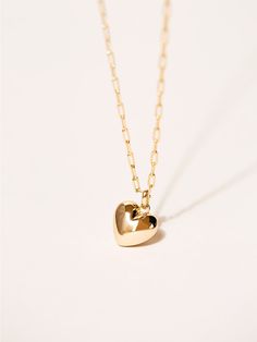 Gold Minimalist Heart Beads Necklace, Gold Minimalist Heart Necklace For Anniversary, Gold Plated Necklace With Heart Charm For Anniversary, Gold Heart Detail Charm Necklace As Gift, Gold Heart Pendant Charm Necklace, Gold Charm Necklace With Heart Detail For Gift, Gold Charm Necklaces With Heart Detail For Valentine's Day, Gold Charm Necklace With Heart Detail As Gift, Gold Heart Detail Necklace For Gift