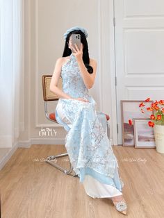 🌻This listing is for 1 long dress and headpiece  Pre-made ao dai (Vietnamese long dress) for women/girls. Material: Double layers voan/silk - Stretchy level : 0/10 🌻 The measurement of this ao dai (long dress) is in Vietnamese size (American size tends to be bigger for the same size). Please LOOK AT THE SIZE CHART CAREFULLY BEFORE ORDERING. There might have some chalk writings on the fabric due to making process. These marks can be washed away easily. 🌻🌻No returns or exchanges Buyer can contact seller about any issues with an order. 🌸 Follow us Facebook/aodaiemily www.aodaiemily.com 💜 Thank you very much!💜 Sleeveless Spring Wedding Cheongsam, Spring Wedding Sleeveless Cheongsam, Fitted Sleeveless Summer Cheongsam, Sleeveless Ao Dai For Wedding, Fitted Sleeveless Spring Cheongsam, Summer Wedding Ao Dai With Floral Print, Fitted Blue Ao Dai For Summer, Summer Fitted Blue Ao Dai, Fitted Ao Dai For Summer Weddings