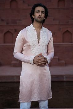 Powder pink satin linen kurta with French knot embroidery in kaleidoscope pattern. Paired with contrast pant.
Components: 2
Pattern: Embroidered
Type Of Work: French Knot
Neckline: Mandarin
Sleeve Type: Full
Fabric: Satin Linen
Color: Pink
Other Details: 
Front buttons
Occasion: Wedding - Aza Fashions Knot Embroidery, Kaleidoscope Pattern, French Knot Embroidery, Kurta Set For Men, Linen Color, French Knot, Fashion App, Kurta Set, Powder Pink