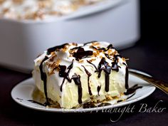 a piece of cake sitting on top of a white plate