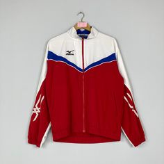 Vintage Rare MIZUNO Light Jacket Big Logo Mizuno Windbreaker Full Zipper Jacket Mizuno Striped Jacket Red Colour Unisex Large Size CONDITION :- ✅GOODUSED CONDITION. ✅NO STAINS  ✅NO HOLE ITEM DESCRIPTION:- ✅SIZE: LARGE ✅MATERIAL : COTTON ✅THIS USED & VINTAGE ITEMS, SO DON'T EXPECTED IT TO BE LIKE NEW CONDITION!! MEASUREMENT: ✅ARMPIT TO ARMPIT : 21.5 INCH ✅LENGHT NECK TO : 26.5 INCH  ✅SHOULDHER : 21.5 INCH ✅SLEEVE: 25 INCH PLEASE REFER PHOTO BEFORE ORDER √ALL MEASUREMENTS ARE TAKEN WITH THE GARMENT FLAT ON THE GROUND √WE SHIP BY POST VIA MALAYSIA INTERNATIONAL REGISTERED/SIGNED FOR WITH TRACKING NO. TRACKING NUMBER WILL BE GIVEN. √THE PARCEL WILL BE ARRIVE WITHIN 10-14 WORKING DAYS OR MORE DUE TO THE LOCATION & CUSTOMS CLEARINGS. √BUYER DON'T HESITATE TO ASK ME IF ANY INQUIRY ABOUT ITEM BEFO Retro Red Track Jacket For Outdoor, Red Retro Track Jacket For Outdoor, Red Long Sleeve Sportswear Track Jacket, Retro Red Sports Outerwear, Red Long-sleeved Track Jacket For Sports, Red Track Jacket For Sports, Red Long Sleeve Track Jacket For Sports, Striped Jacket, Red Colour