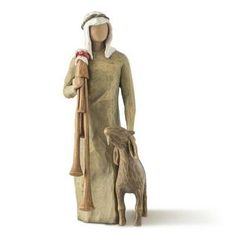 a figurine of a person with a dog