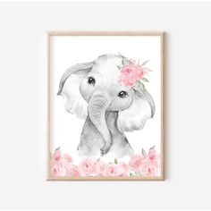 an elephant with flowers on it's head is in front of a pink background