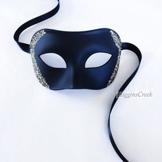 "Elegant Mens Masquerade mask, Custom Mens venetian mask, Black tie Masquerade Ball, Halloween Mens Mask, Black with Gold Mask MORE COLORS Simple and elegant Black Masquerade Masks for Men. The masks can be colored in a variety of shimmers. Picture shown has black with shimmer (Light Gold Shown, Other colors available). S H I P P I N G - Last minute masquerade mask shopping? Processed same day or within 24 hours. 1-2 day guaranteed delivery services offered, add items to cart and click on shippi Black Formal Eye Mask Masquerade, Black Formal Eye Mask, Formal Black Eye Mask, Black Formal Masquerade Mask For Halloween, Venetian Masquerade Mask For Halloween Formal, Carnival Formal Eye Mask, Venetian Style Formal Eye Masquerade Mask, Formal Venetian Eye Mask For Masquerade, Black Tie Masquerade