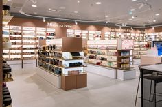 the inside of a cosmetics store with shelves full of products