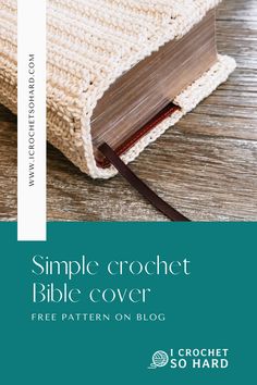 the simple crochet bible cover is shown on a wooden table with a book