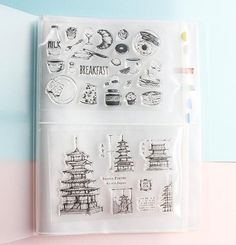 a package of clear stamps with various stickers on it, including pagodas and other things