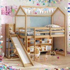 a child's bedroom with a slide in the floor and lots of confetti