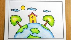 a drawing of the earth with trees and a house on it, in front of a wooden table