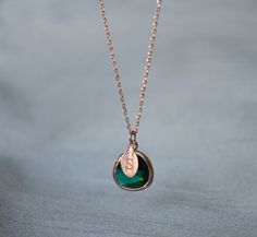 "This beautiful emerald necklace would be a perfect gift for a wedding, birthday, anniversary, graduation or for any occasion. Please click here to view the matching earrings: https://www.etsy.com/listing/751135665/emerald-earrings-may-birthstone-gift-may?ga_search_query=emerald&ref=shop_items_search_4&pro=1&frs=1 The rose gold plated emerald pendant is made of glass and is a gorgeous deep green shade. It measures approximately 12.5x 16 mm and is hung on a 16\", 18\" or 20\" chain. P Sterling Silver Emerald Necklace For Wedding, May Birthstone, Sterling Silver Emerald Necklace For Weddings In May, Rose Gold Birthstone Necklace For May Birthstone Gift, Rose Gold Birthstone Necklace For May, Gift, Green Birthstone Necklace For May Birthday Gift, Emerald Necklace Gift For Her - May Birthstone, Emerald Birthstone Necklace For May, Wedding Necklace With May Birthstone, Green Emerald Necklace For May Birthstone Gift