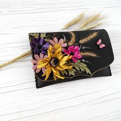 https://www.etsy.com/listing/626658176/wildflower-painted-clutchpoppies-daisies?ref=shop_home_active_2 Handmade Black Evening Bag For Gift, Black Pouch Clutch As Gift, Black Evening Bag With Removable Pouch As Gift, Elegant Yellow Clutch As Gift, Purse Painting, Colorful Clutch, Bridesmaid Clutch, Purse Design, Statement Handbag