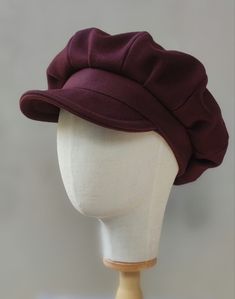 Introducing our Vintage Style Wool Newsboy Cap, a timeless and versatile accessory that seamlessly combines classic charm with winter warmth. Available in an array of colors including Black, Red, Grey, and Burgundy, this cap is designed to elevate your winter ensemble. 🌈 A Palette of Elegance: Choose from a variety of rich colors -- Black, Red, Grey, and Burgundy -- to suit your style and mood. Each hue adds a touch of sophistication to this vintage-inspired newsboy cap. ❄️ Winter-Ready Warmth: Crafted from high-quality wool, this cap is not just a fashion statement but also a practical winter accessory. Stay warm and stylish throughout the season. 🧢 Classic 8-Panel Design: Embodying the timeless bakerboy style, this cap features 8 panels that capture the essence of vintage fashion. The Newsboy Cap Women, Wool Cloche Hat, Baker Boy Cap, Baker Boy Hat, Retro Hats, Elegant Hats, Baker Boy, Boy Hat, Winter Hats For Women