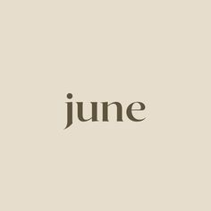 the word june written in black on a beige background