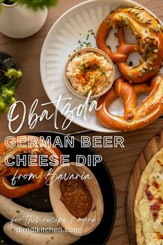 german beer cheese dip with pretzels and other appetizers on a table