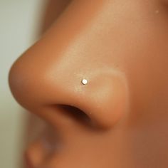 a close up view of the side of a woman's nose