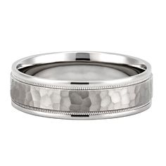 a men's wedding band in white gold