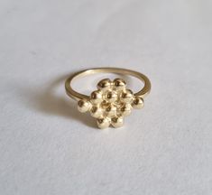 Bunch of grapes ring, gold plated ring, handmade ring, designer ring, vintage ring, dainty ring, delicate gold ring, gift ring for girls A delicate band decorated with a handmade bunch of grapes top, which was designed in a vintage style. Dimensions: The top size is 1.25x1 cm (0.5x0.4 inches) It is available in multiple sizes. Please choose at checkout. This delicate gold ring is available both in 14k gold plating and sterling silver and a beautiful gift ring for girls and bridesmaid. It can als Handmade Delicate 14k Gold Rings, Delicate Handmade 14k Gold Rings, Handmade Elegant 14k Gold Stackable Rings, Handmade 14k Gold Open Midi Rings, Elegant Handmade Yellow Gold Stackable Rings, Elegant Handmade 14k Gold Stackable Rings, Handmade Recycled Gold Promise Ring, Handmade Dainty Rings In Recycled Gold, Gold Plated Dainty Stackable Rings As Gift