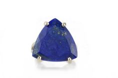 This 925 Sterling silver ring flaunts a faceted, trillion cut Lapis Lazuli. Beautiful detailing highlights this September birthstone ring with the natural features of its stone. This birthstone jewelry is the perfect accessory for women who love some bold color and classic cut and design. ☛ 𝒜𝐵𝒞 - Add Engraving - https://etsy.me/2ZSRjhu ☛ Ring size - Select the size you would like from the drop down menu ♥ Gemstone Type - Lapis Lazuli ♥ Gemstone Size - 18x18x18mm ♥ Gemstone Cut - Trillion ♥ Me Trillion Cut Sterling Silver Ring With Gemstone, Silver Trillion Cut Sapphire Ring, Elegant Pyramid-shaped Gift Ring, Silver Trillion Cut Gemstone Ring, Trillion Cut Polished Ring, Gift, Trillion Cut Rings With Polished Finish For Gift, Trillion Cut Ring With Polished Finish As Gift, Silver Triangle Rings For Gifts, Silver Triangle Rings For Gift