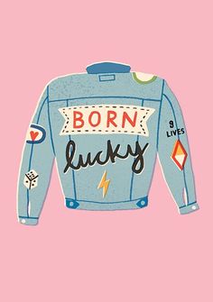 a blue jean jacket with the words born lucky written in black ink on pink background