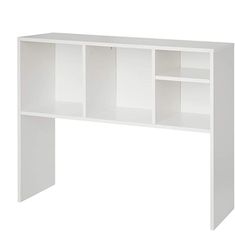 a white desk with two open shelves on the top and one closed shelf below it