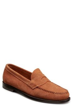 This hand-sewn suede penny loafer showcases handsome stitching and flat-strap styling for all-day, everyday sophistication. Arch support Leather upper, lining and sole Imported Classic Suede-lined Moccasins For Business Casual, Classic Moccasins With Suede Lining For Business Casual, Classic Moc Toe Loafers With Suede Lining, Classic Moccasins With Suede Lining And Plain Toe, Classic Moc Toe Moccasins With Suede Lining, Classic Moccasins With Suede Lining, Classic Plain Toe Moccasins With Suede Lining, Classic Suede Moccasins With Almond Toe, Classic Moccasins With Suede Lining For Fall