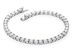 14.35ctw round Lab Created Strontium Titanate rhodium over sterling silver tennis bracelet. Measures approximately 7 & 1/4" L X 5/16" W and has a hidden box clasp. Luxury Tennis Bracelet With Channel Set For Formal Occasions, Luxury Channel Set Tennis Bracelet For Formal Occasions, Formal Diamond Tennis Bracelet Channel Set, White Gold Channel Set Diamond Bracelet, Classic Tennis Bracelet Channel Set For Anniversary, Classic Channel Set Tennis Bracelet For Anniversary, Fine Jewelry Tennis Bracelet With Channel Set For Wedding, Platinum Round Tennis Bracelet With Prong Setting, Silver Tennis Bracelet With Round Cut For Formal Occasions