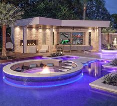 a house with a pool and fire pit in the middle is featured for pinnacle awards