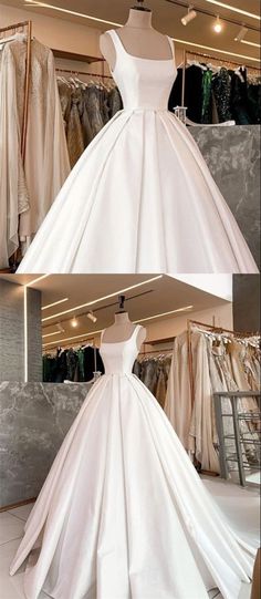 a white wedding dress on display in a store