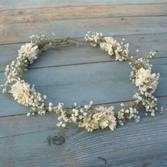 a flower crown is laying on the ground