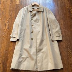 Almost Brand New Condition Burberry’s Trench Coat. It Doesn’t Say The Size, But I’m A Medium In Men’s, I’m 6’1” 170 Lbs And It Fits Me Perfectly. It Has A Few Stains On It But Nothing Serious, All The Buttons Are Still Solid And Function Well, The Inner Lining Is Starched And Well. Very Warm, Comfy, And Stylish. Male Of Female Or Anything In Between Can Wear This Coat This Winter. Classic Gabardine Outerwear For Daywear, Classic Long Coat Outerwear For Daywear, Classic Long Coat For Daywear, Classic Outerwear With Button Cuffs, Classic Outerwear With Button Cuffs For Daywear, Classic Single Breasted Outerwear For Daywear, Classic Single-breasted Outerwear For Daywear, Classic Tailored Outerwear For Daywear, Classic Fitted Outerwear For Daywear